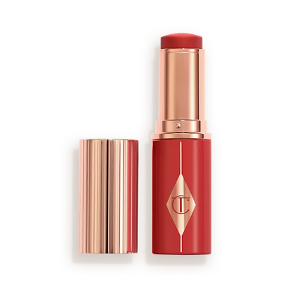 CHARLOTTE TILBURY UNREAL LIP + CHEEK GLOW BLUSH STICK WITH HYALURONIC ACID