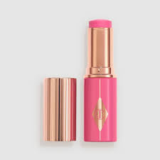CHARLOTTE TILBURY UNREAL LIP + CHEEK GLOW BLUSH STICK WITH HYALURONIC ACID